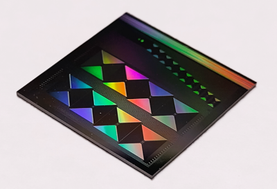 Trapping sound and light on a chip